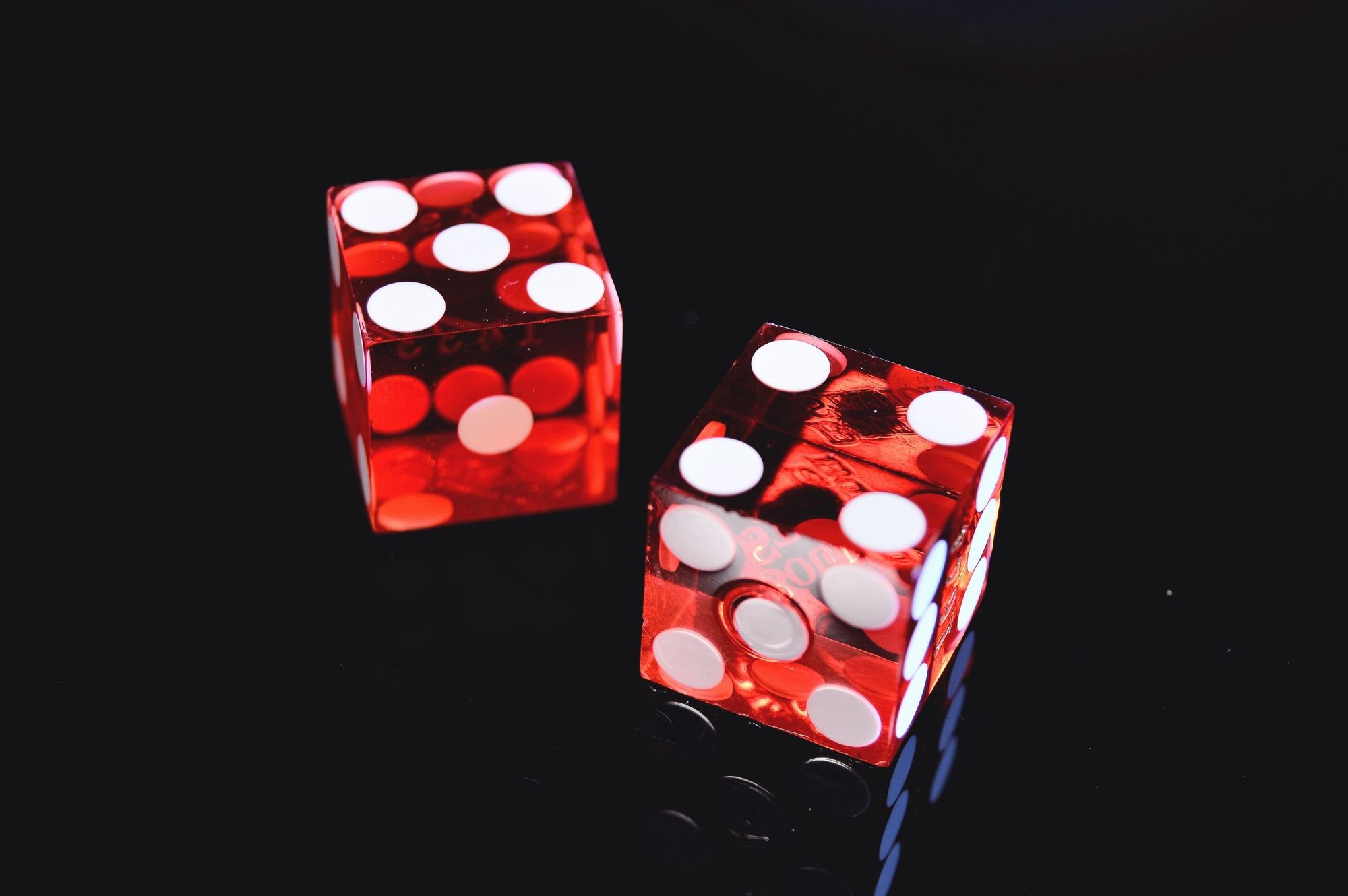 Two red dice (5 and 4)