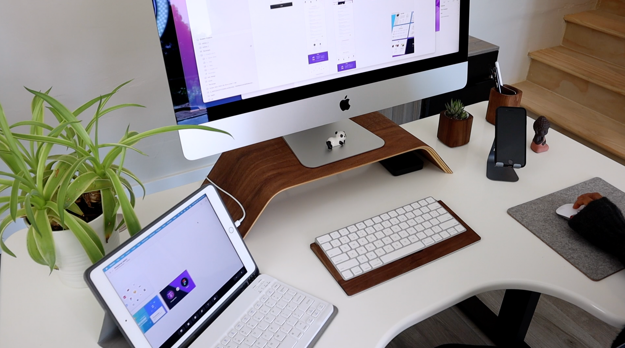 Apple iPad and iMac on desk